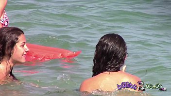 Two Italian Girls Playing Under The Water On The Topless Beach